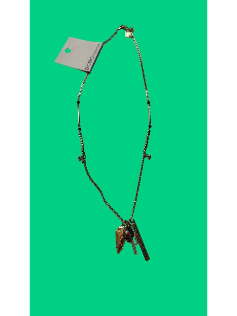 BCBGGeneration Gold-Tone Charm Necklace With Crystal Accents & "Explore" Pendant